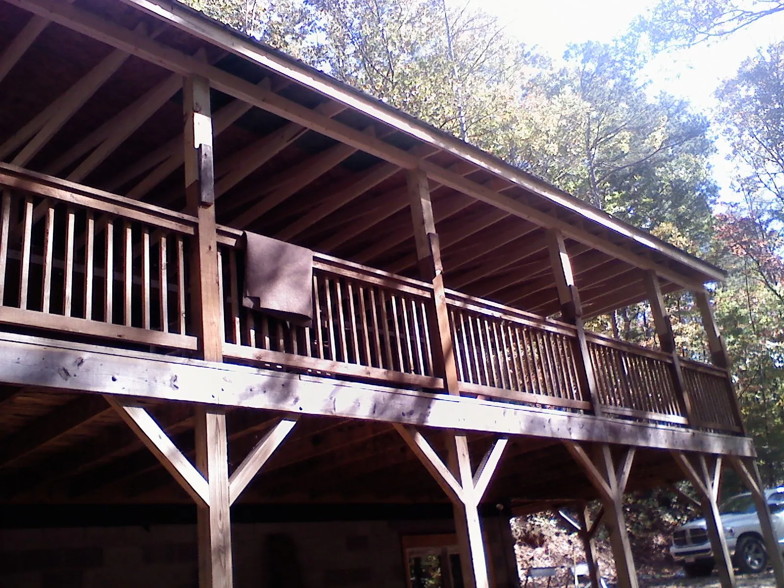 Timber framing under a new elevated porch and deck — Roof Leak Repair in Magee by Roofing Brothers